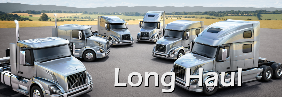 The words Long Haul, over three large trucks